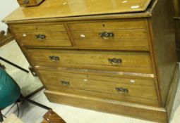 A late 19th/early 20th Century ash wardrobe and matching dressing chest,