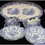 A collection of assorted blue and white china wares to include Spode plate decorated with figures