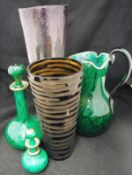 Two large mottled green "malachite" glass ewers with applied gilt decoration,