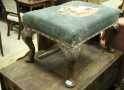 A Victorian mahogany drop-leaf Pembroke table with end drawer raised on ringed and turned legs to