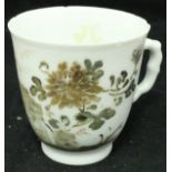 A Chinese export teacup with floral decoration CONDITION REPORTS Numnerous small