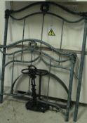 A cast iron umbrella stand,