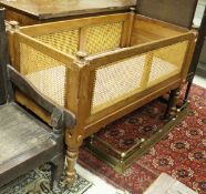 A 19th Century child's mahogany framed Bergère cot,