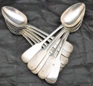 A set of twelve Victorian silver "Fiddle" pattern dessert spoons (by Robert Williams, Exeter 1839),