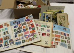 One box of stamps and postcards one box of English coins