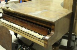 A Victorian walnut cased grand piano by Emerich Betsy in Wien,
