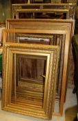 A collection of eight large gilt picture frames