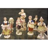 Six Sampson porcelain figurines with gilt anchor mark to the bases and one further similar figurine