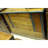 A modern mahogany dressing chest unit,