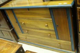 A modern mahogany dressing chest unit,