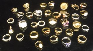 A large collection of assorted dress rings to include various gold,