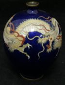 A circa 1900 cloisonne vase with three-toed dragon decoration on a blue ground CONDITION