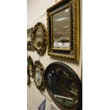 Five assorted wall mirrors to include rectangular wall mirror in moulded gilt frame,