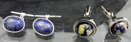 A pair of white metal and lapis lazuli cufflinks and a pair of white metal and revolving globe