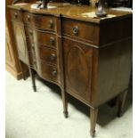 A modern mahogany serpentine fronted sideboard,