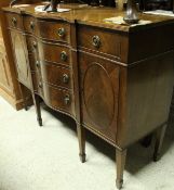 A modern mahogany serpentine fronted sideboard,