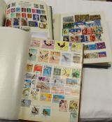 Three albums of assorted World stamps