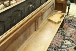 A circa 1900 pitch pine pew of typical form