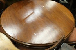 A Victorian mahogany circular breakfast table,