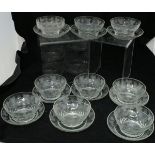 A collection of nine Waterford style sundae dishes on stands with grape and vine decoration and two