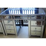 A modern mirrored dressing table,
