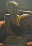 FABIAN PEREZ "Sultry woman seated on a couch", hand-embellished canvas print on board,