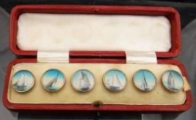 A set of six buttons with hand-painted decoration of sailing boats,