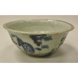 A Chinese bowl decorated in white and blue foliate pattern,