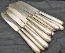 A set of twelve George V silver fish knives (Hawksworth, Eyre & Co. Ltd, Sheffield 1914), 21.
