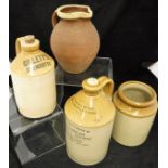 An assorted quantity of stoneware jars, bottles and jugs, to include "Collett's Cirencester",