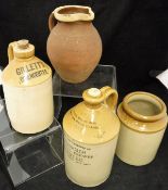 An assorted quantity of stoneware jars, bottles and jugs, to include "Collett's Cirencester",