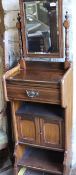 A late Victorian walnut gents shaving stand with mirror