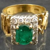 A 1970's 18 carat gold emerald and chip diamond dress ring, approx 6.