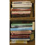 A small wicker hamper and one box containing various reference books on interior design,