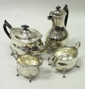 A silver teapot, coffee pot, cream jug and twin-handled sugar bowl (by Hutton & Sons Ltd,