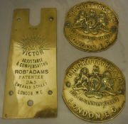Two circular brass wall plaques marked "C.H. Griffiths & Co 43 & 45 Cannon Street, London E.C.
