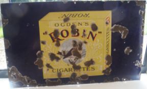 An enamel advertising sign "Ogden's Robin Cigarettes"