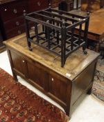 An oak coffer, the three panel top over three plain panel front,