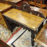 A Victorian Gothic oak side table