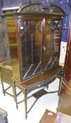 An Edwardian mahogany bookcase on stand,