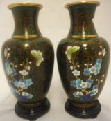 A pair of Chinese cloisonné vases on brown ground decorated with flowers