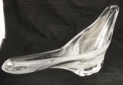 A mid 20th Century Daum France clear glass bowl of stylised elongated design,
