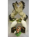 A Royal Belvedere Vienna pottery figure of two rearing horses,