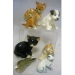 Assorted Lomonosov porcelain animals to include seated cats, lions, cheetah,