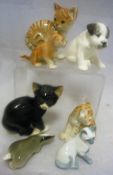 Assorted Lomonosov porcelain animals to include seated cats, lions, cheetah,