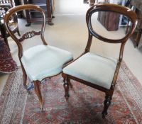 Seven mahogany balloon back dining chairs with seven drop-in seats,