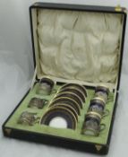 A cased part set of Copeland Spode coffee cans and saucers,