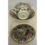 A pair of Meissen Japan pattern tea cups and saucers with blue crossed swords mark to the base