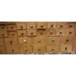 A pine bank of 40 Apothecary drawers