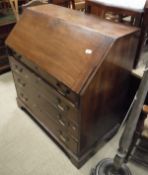 A 19th Century mahogany bureau of four drawers to bracket feet